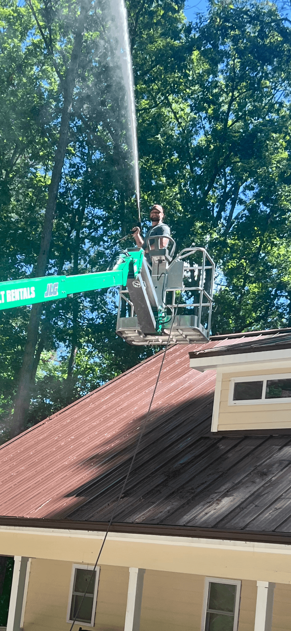 Pool deck pressure washing with surface cleaner in action